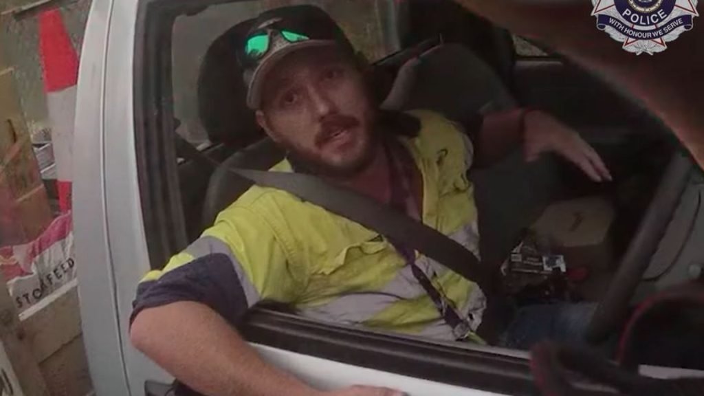 A trucker in Australia fights off a deadly snake while driving