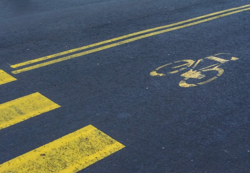 Illustrative stock photo: road markings, car