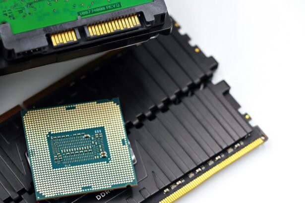 Detailed view of a CPU chip and RAM modules, illustrating computer hardware components.