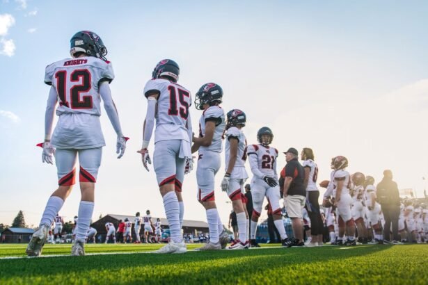 A high school football team lines up on the field, ready for their match.
