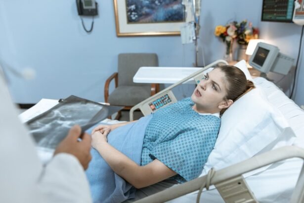 Caucasian woman in hospital bed receiving care from healthcare professional.